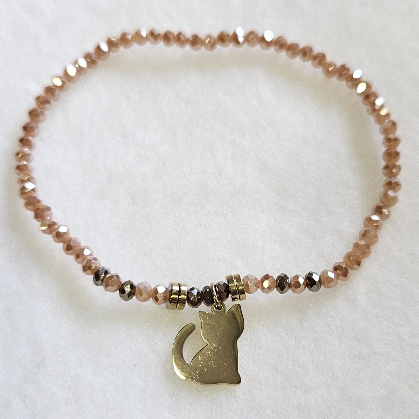 Pulseras de cuentas de cristal en diferentes tonos con gato dorado de acero inoxidable