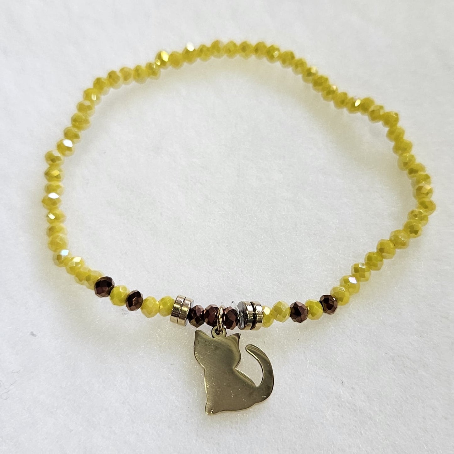 Pulseras de cuentas de cristal en diferentes tonos con gato dorado de acero inoxidable