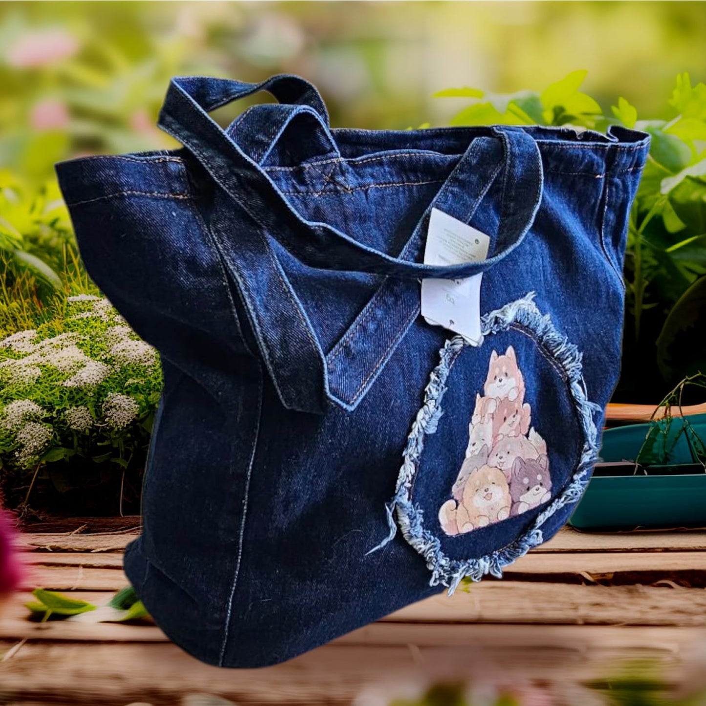 Bolso de hombro denim color oscuro con dibujo de gatitos