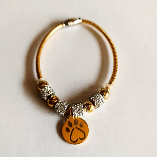 Pulsera de Acero Inoxidable Dorada con Colgante Huella de Amor y Brillantes