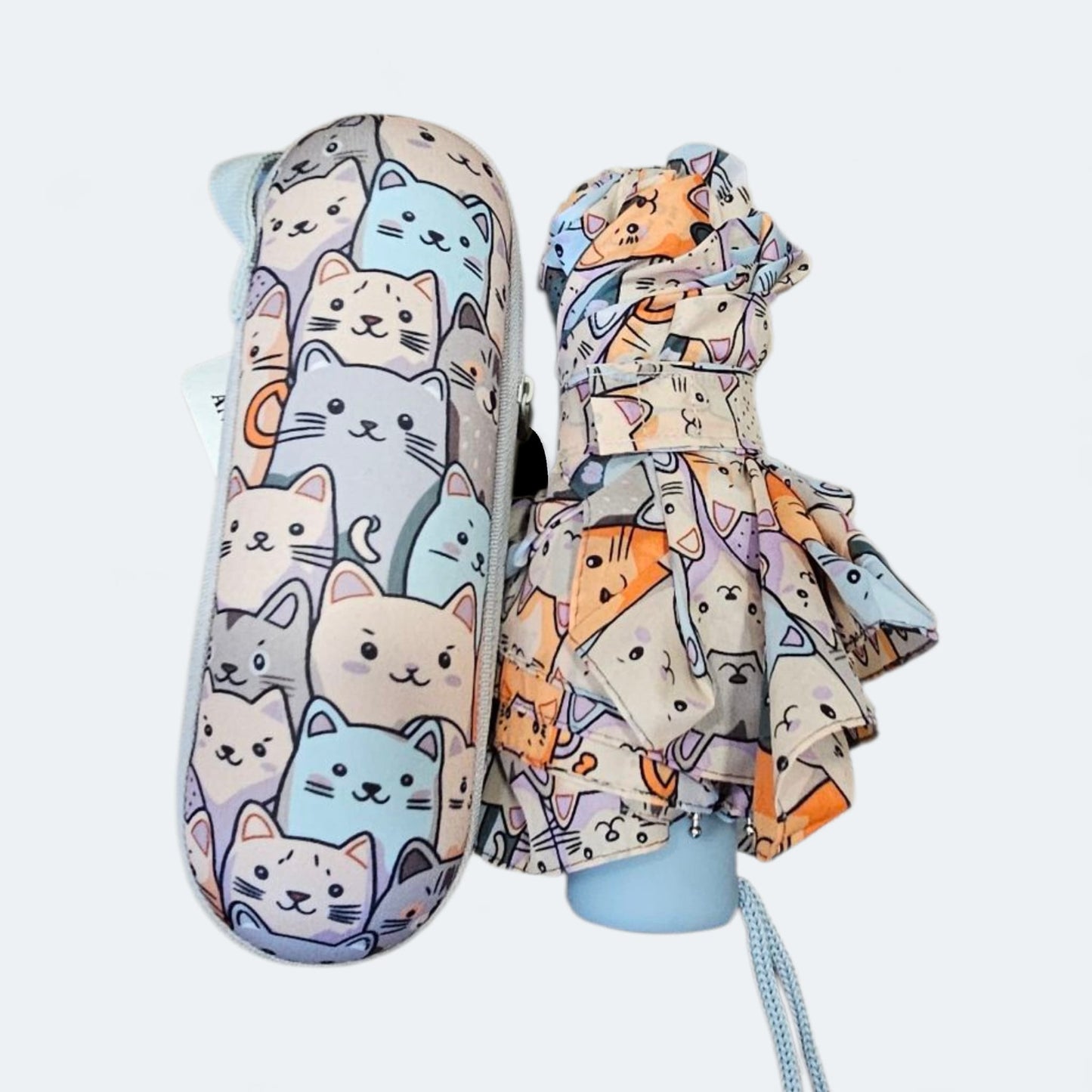 Paraguas plegable con funda rígida antiviento – mango azulón.