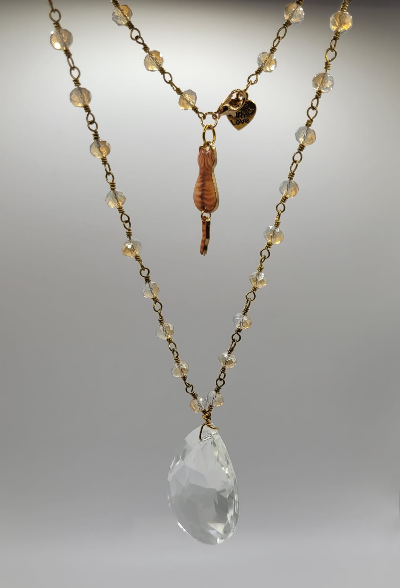 Collar largo con cuentas de cristal y colgante de lágrima de cristal y gatete color naranja