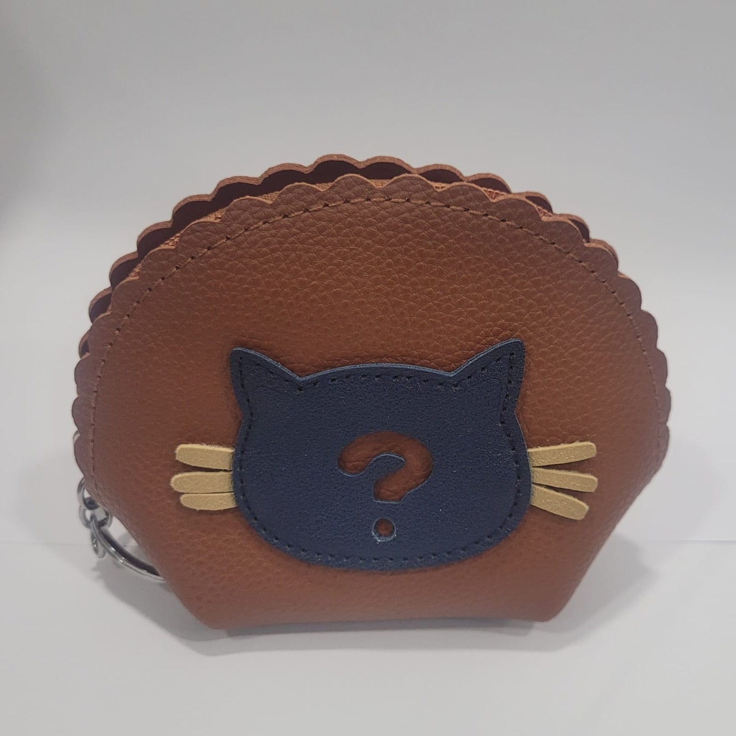 Monedero en diferentes colores con cabeza de gatito