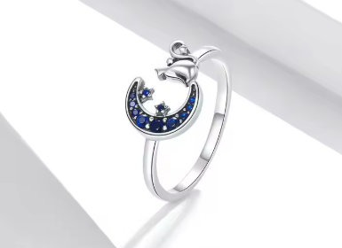 Anillo de plata de ley con gatito y luna de circonitas azules