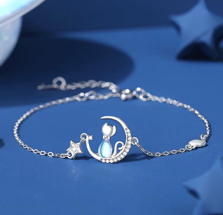 Pulsera de plata de ley con gatito en luna de circonitas blancas