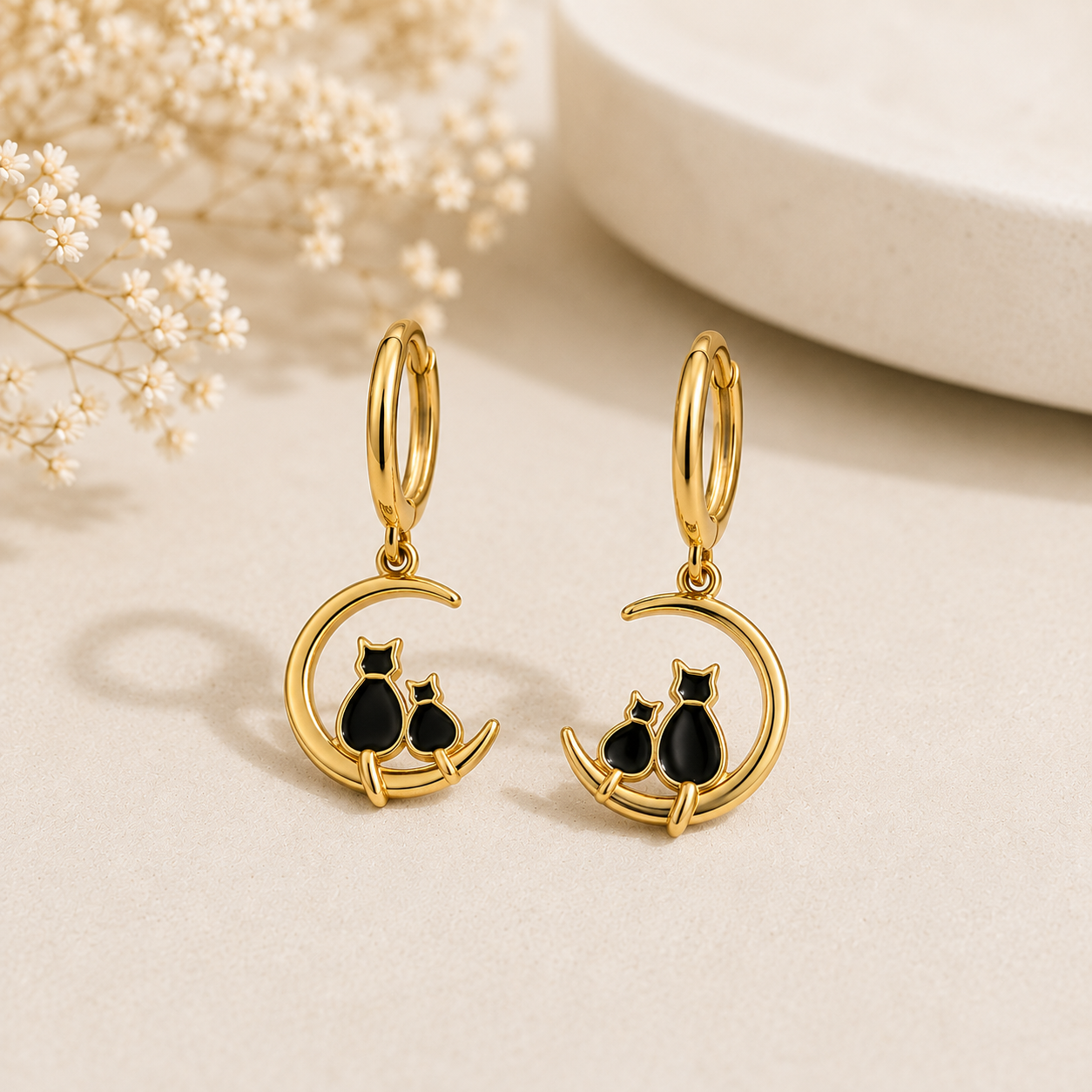 Pendientes de acero inoxidable Gatos en la Luna Dorados.