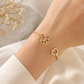 Pulsera Acero inoxidable Corazón y Huella Dorada Ajustable