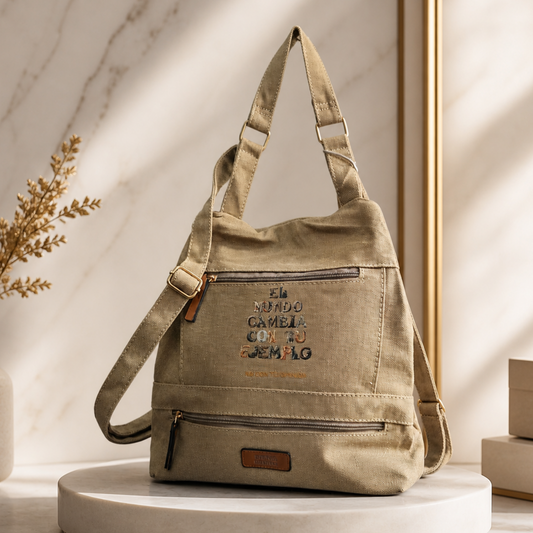 Mochila urbana “El mundo cambia con tu ejemplo, no con tu opinión”. Color beige