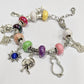 Pulsera de charms con abalorios de gatos