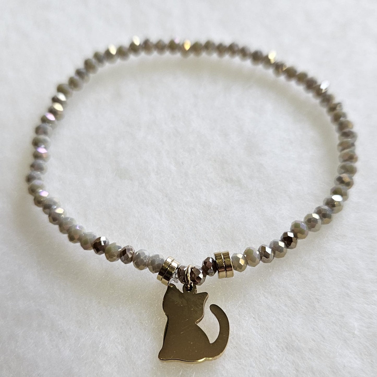 Pulseras de cuentas de cristal en diferentes tonos con gato dorado de acero inoxidable