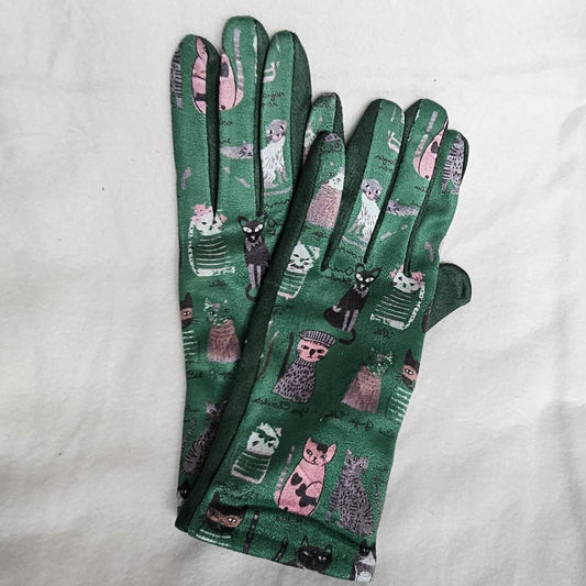 Guantes táctiles estampado colorido de gatitos fondo verde