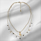 Collar Doble de acero Estelar con Gato Dorado