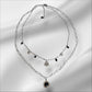 Collar Doble Eclipse de Acero con Detalles Negros