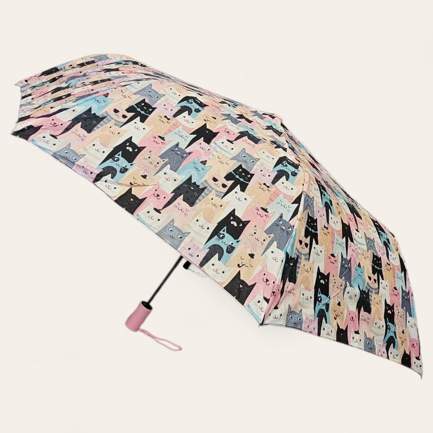 Paraguas plegable antiviento – Estampado de gatos multicolor, mango rosa.