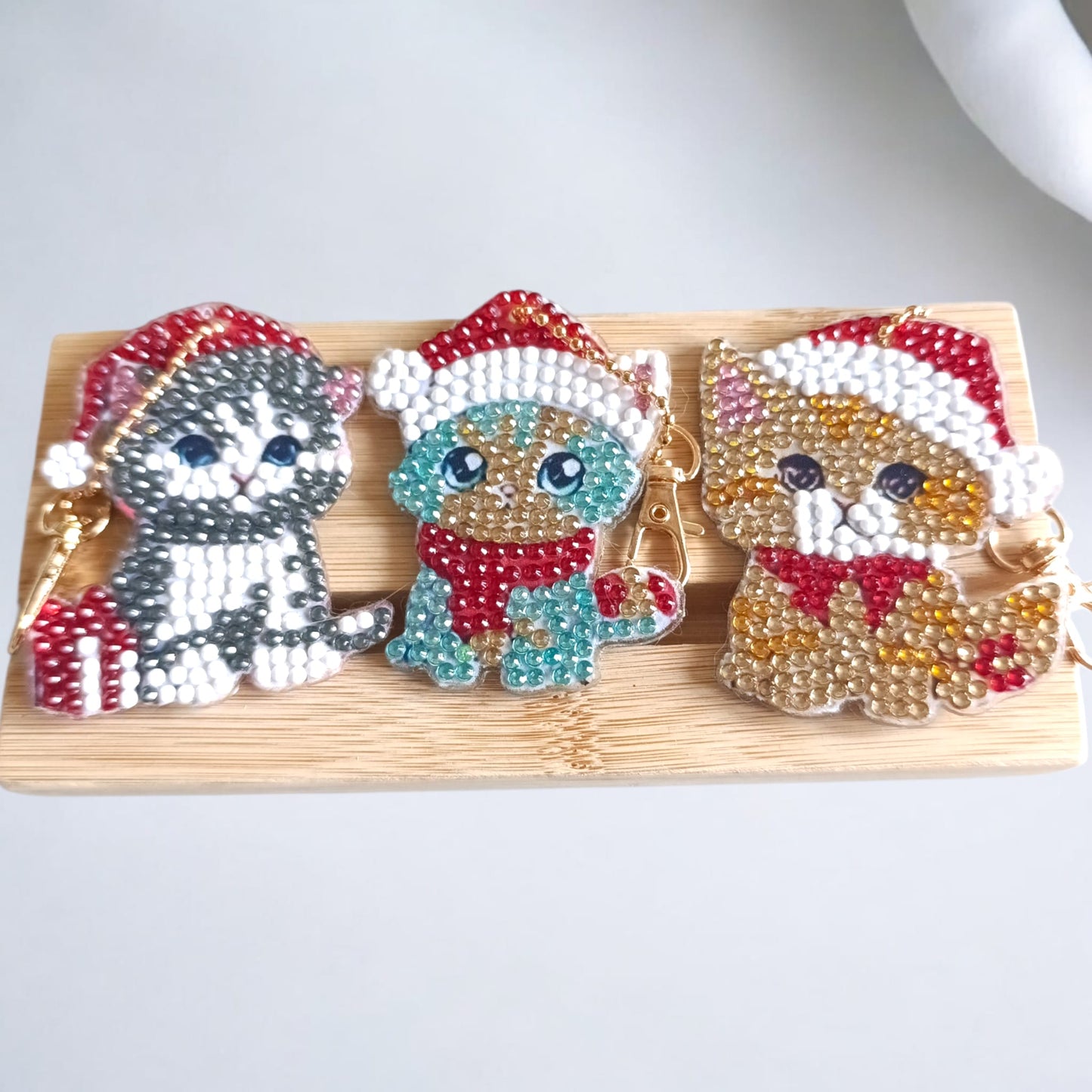 Llaveros Navideños “Michi Brilli-Brilli” – Edición solidaria (Envío aleatorio)