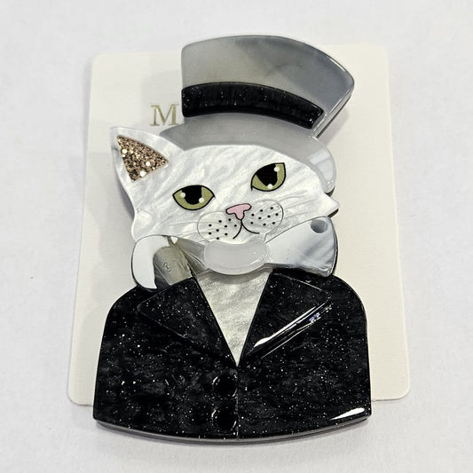 Broche de gatito en resina con pajarita y sombrero