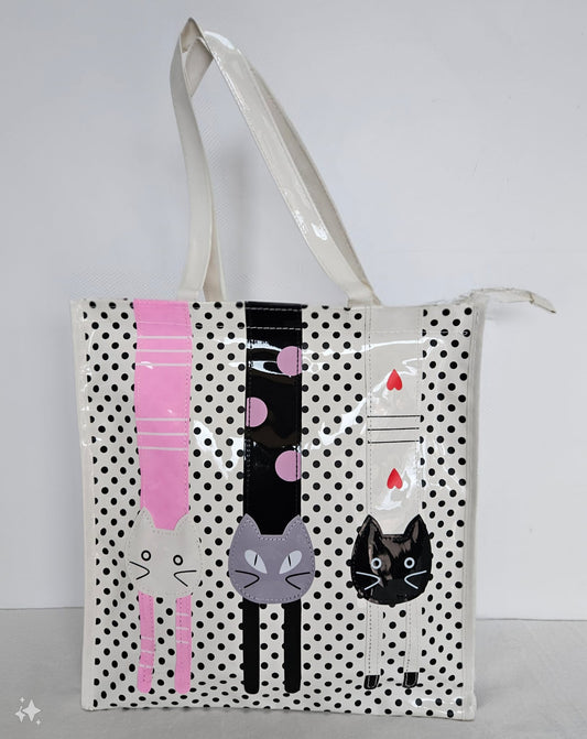 Bolsa Tote-bag plastificada en color blanca con lunares y dibujo de cabeza de gatitos