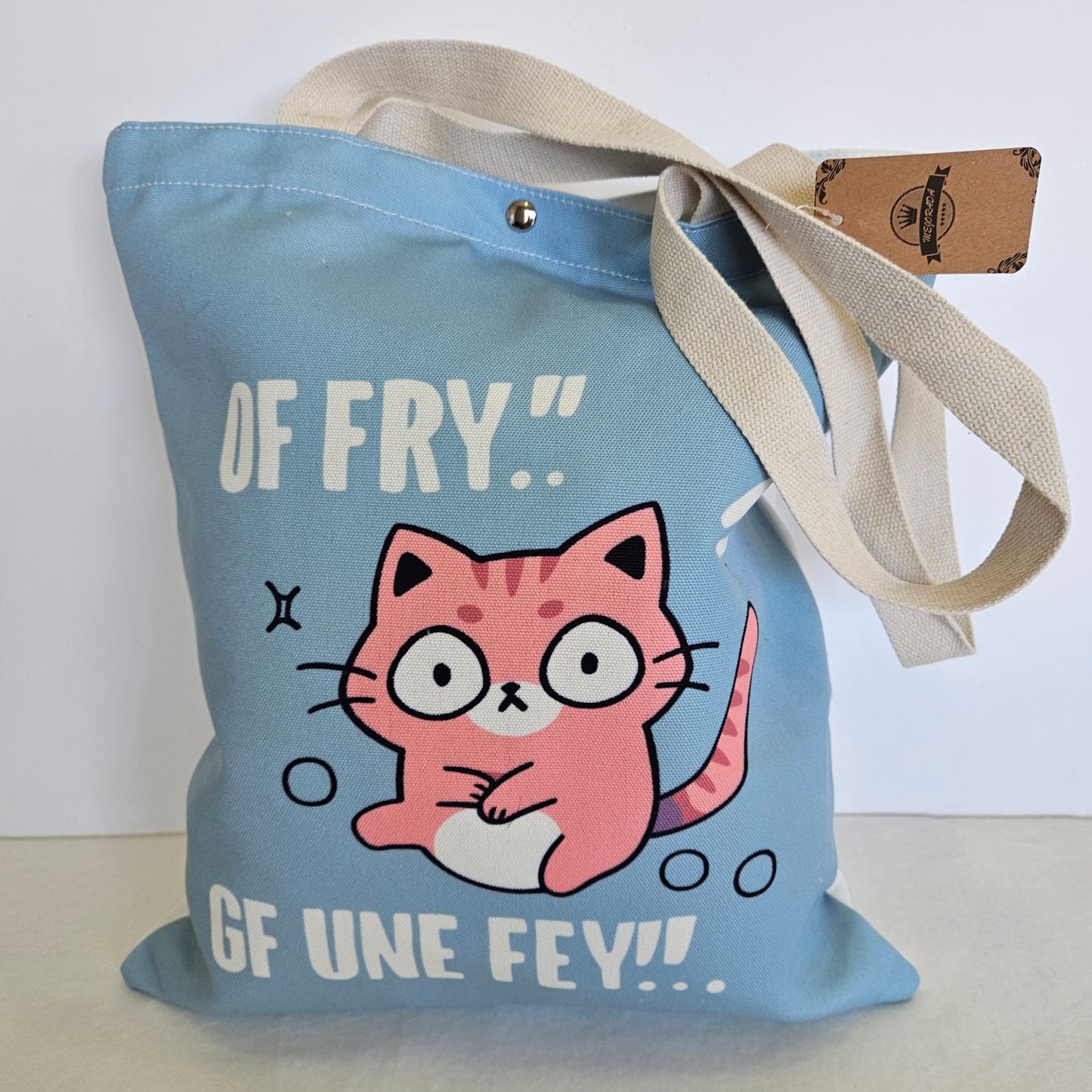 Bolsa tote bag de tela estampado gatito con frase "OF FRY... GF UNE FEY..."