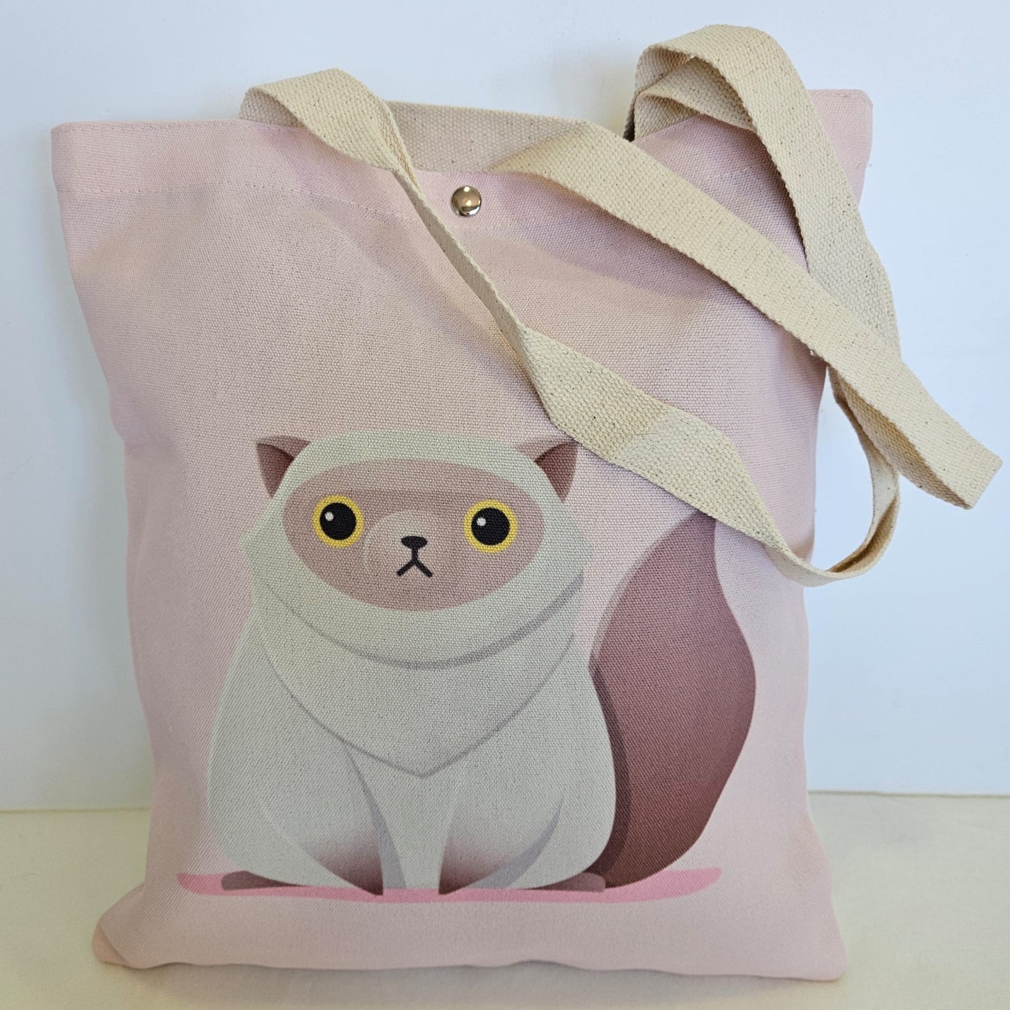 Bolsa tote bag de tela estampado gatito con fondo rosa