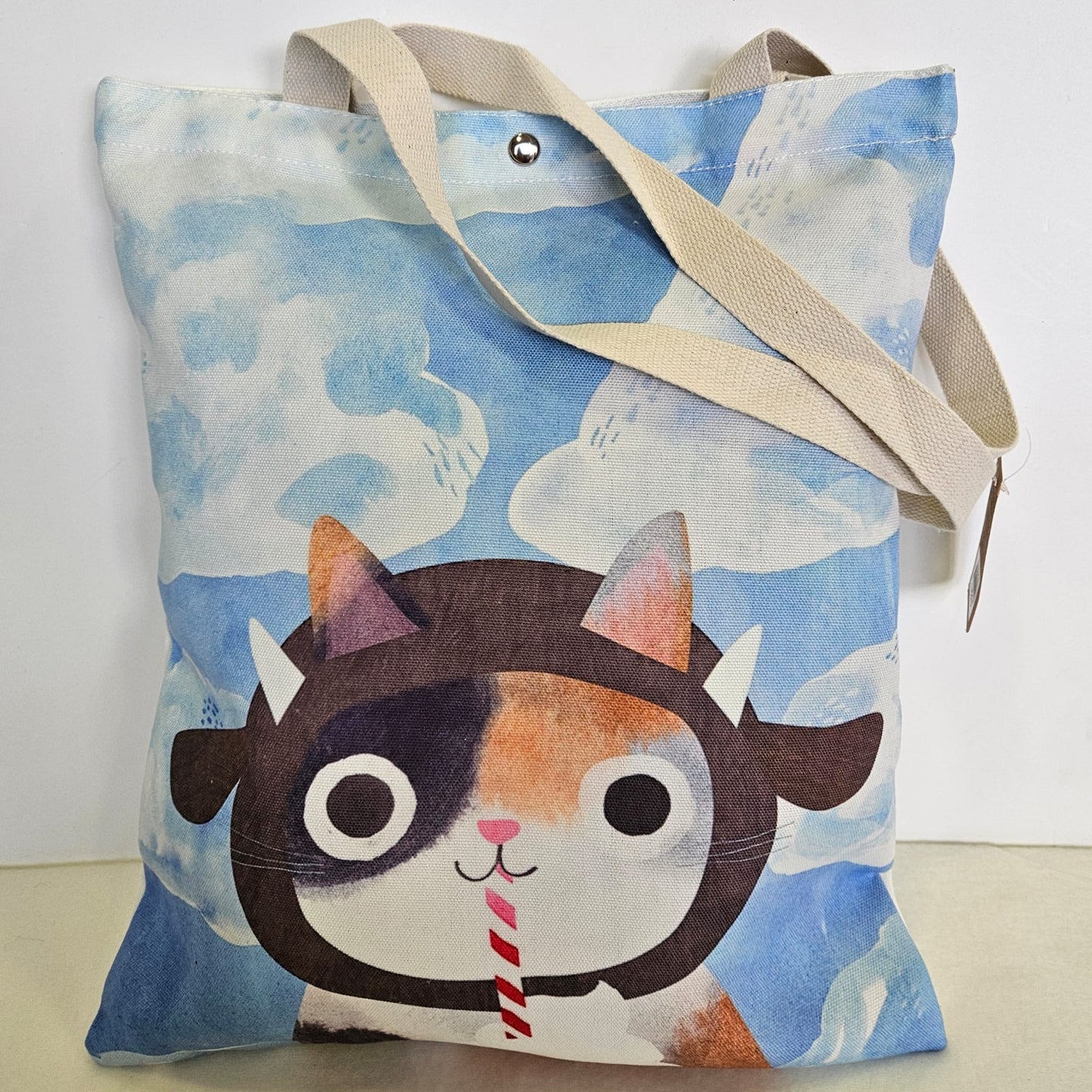 Bolsa tote bag de tela estampado gatito con fondo de nubes