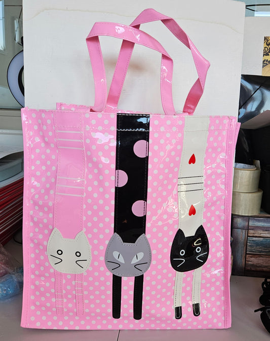 Bolsa Tote-bag plastificada en color rosa con lunares y dibujo de cabeza de gatitos