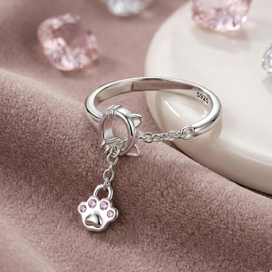 Anillo de Plata de Ley ajustable con cabeza de gatito y huella con circonita rosa